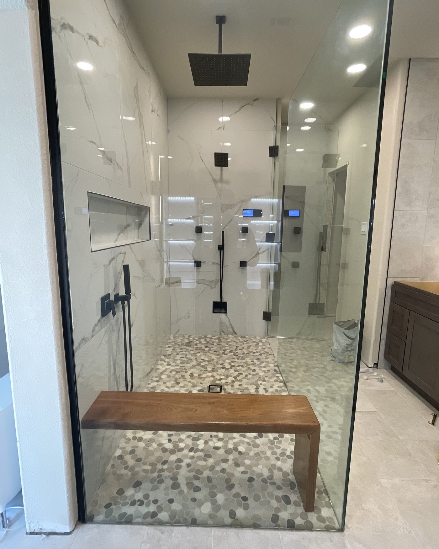 Finished walk-in shower remodel by Bravo Zulu Restoration